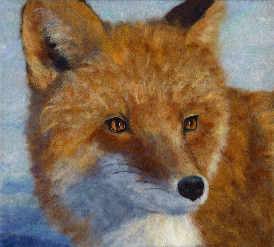 Outfoxed by Karen Straight — a red fox in close portrait against a pale blue ground, built from layers of felted wool fiber.